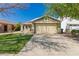 Charming single-story home with a well-manicured lawn and inviting front porch at 10704 E Plata Ave, Mesa, AZ 85212