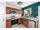 Well-lit kitchen featuring stainless steel appliances and granite countertops at 10704 E Plata Ave, Mesa, AZ 85212