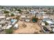 Aerial view of a home with a large lot and nearby residential neighborhood at 11512 E 6Th Ave, Apache Junction, AZ 85120