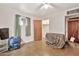 Bedroom with natural light and spacious closet and neutral walls, simple and comfortable at 11512 E 6Th Ave, Apache Junction, AZ 85120