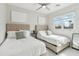 Bedroom showcasing two twin beds, neutral tones, and a window providing natural light at 12201 N 66Th St, Scottsdale, AZ 85254