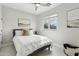 Bedroom featuring a full-size bed, simple decor, and a window providing lots of natural light at 12201 N 66Th St, Scottsdale, AZ 85254