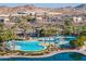 Aerial view of a community pool and lakeside grill at 13849 S 179Th Ave, Goodyear, AZ 85338