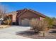 Beautiful home featuring a tile roof, desert landscaping, and an attached two-car garage at 13849 S 179Th Ave, Goodyear, AZ 85338