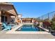 Backyard with private pool and covered patio at 13849 S 179Th Ave, Goodyear, AZ 85338