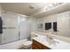 Functional bathroom featuring a vanity with a sink, a large mirror, and a shower with sliding glass doors at 1402 E Guadalupe Rd # 145, Tempe, AZ 85283