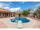 Backyard featuring a refreshing pool perfect for summertime fun, and covered patio for relaxing at 14404 N 56Th Pl, Scottsdale, AZ 85254