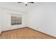 Bright bedroom with natural light, ceiling fan and laminate floors at 14404 N 56Th Pl, Scottsdale, AZ 85254