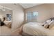 Bright bedroom with neutral decor and mirrored closet doors at 14447 N 100Th Way, Scottsdale, AZ 85260