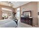 Bright main bedroom with ensuite bathroom and sliding door access at 14447 N 100Th Way, Scottsdale, AZ 85260