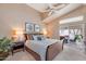 Serene main bedroom with vaulted ceiling and access to the patio at 14447 N 100Th Way, Scottsdale, AZ 85260