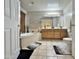 Bright bathroom featuring a soaking tub, tile flooring, and a double vanity with ample counter space at 14545 S Cherry Hills Dr, Arizona City, AZ 85123