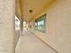 Covered entryway featuring decorative columns, offering a welcoming entrance at 14545 S Cherry Hills Dr, Arizona City, AZ 85123