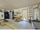 Well-organized garage featuring storage cabinets, workbench, and ample space for projects and tools at 14545 S Cherry Hills Dr, Arizona City, AZ 85123