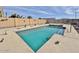 Inviting rectangular pool with stylish desert landscaping and clear blue water for summer fun at 14545 S Cherry Hills Dr, Arizona City, AZ 85123