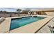 The sparkling pool is the focal point of this backyard retreat, ready for you to enjoy on sunny days at 14545 S Cherry Hills Dr, Arizona City, AZ 85123