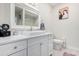 Bright bathroom features a white vanity with vessel sink, framed mirror, and elegant decor at 14950 W Mountain View Blvd # 5308, Surprise, AZ 85374