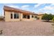 Well-maintained backyard featuring desert landscaping, a patio, and a tranquil outdoor space at 15924 W Falcon Ridge Dr, Sun City West, AZ 85375