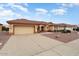 Charming home featuring a two-car garage, front yard desert landscaping, and a welcoming front entrance at 15924 W Falcon Ridge Dr, Sun City West, AZ 85375