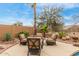 Cozy backyard patio area with comfortable seating, perfect for enjoying the serene desert surroundings at 16830 S Coleman St, Phoenix, AZ 85045