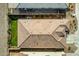 Overhead view of a well-maintained home featuring a tile roof, green lawn, and organized outdoor space at 1743 W Flintlock Dr, San Tan Valley, AZ 85144