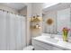 Bathroom featuring a white vanity, mirror, and a shower with a white curtain at 1743 W Flintlock Dr, San Tan Valley, AZ 85144