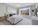 Serene bedroom featuring a king-size bed, scenic views, and a calming neutral color palette at 1743 W Flintlock Dr, San Tan Valley, AZ 85144