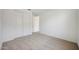 Serene bedroom with soft carpet, closet, and inviting natural light at 18432 W Mohave St, Goodyear, AZ 85338