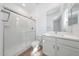 Bright bathroom with a glass shower and modern vanity at 18444 W Mohave St, Goodyear, AZ 85338