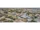 Gorgeous aerial view of a residential area featuring a home with a pristine pool, landscaping, and a backyard at 19318 E Walnut Rd, Queen Creek, AZ 85142