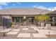 Beautiful backyard, including patio, outdoor kitchen, and a fire pit at 19318 E Walnut Rd, Queen Creek, AZ 85142