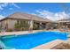 Sparkling swimming pool with view of the backyard and patio at 19318 E Walnut Rd, Queen Creek, AZ 85142