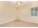 Bedroom featuring neutral walls, tile flooring, and natural lighting at 19318 E Walnut Rd, Queen Creek, AZ 85142