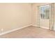 Bright bedroom with neutral walls, carpet flooring, and a window for natural light at 19318 E Walnut Rd, Queen Creek, AZ 85142