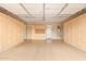 Well-organized garage with built-in cabinets along the walls and epoxy flooring at 19318 E Walnut Rd, Queen Creek, AZ 85142