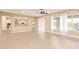 Open-concept living room with view into adjacent kitchen and natural light at 19318 E Walnut Rd, Queen Creek, AZ 85142