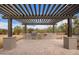 Outdoor kitchen area featuring a built-in grill and ample counter space, ideal for gatherings at 19318 E Walnut Rd, Queen Creek, AZ 85142