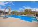 Sparkling pool and patio area perfect for outdoor relaxation and entertainment at 19318 E Walnut Rd, Queen Creek, AZ 85142