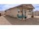 Exterior view of the backyard casita with a covered patio at 20212 N Valencia Dr, Maricopa, AZ 85138