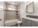 Bathroom features a shower-tub combination with neutral tiling and a modern vanity at 20212 N Valencia Dr, Maricopa, AZ 85138