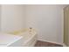 Bright bathroom features a soaking tub and glass enclosed shower at 20212 N Valencia Dr, Maricopa, AZ 85138