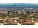 Neighborhood view features residential rooftops and the city skyline at 20524 W Nelson Pl, Buckeye, AZ 85396