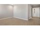 Open living room featuring tile flooring and pre-wired wall at 21323 N 61St St, Phoenix, AZ 85054