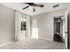 Bedroom featuring neutral colored walls, carpet, a ceiling fan, and natural light at 2201 N 17Th Ave, Phoenix, AZ 85007