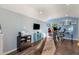 Bonus room featuring a vaulted ceiling, wood floors, and natural light at 2201 N 17Th Ave, Phoenix, AZ 85007