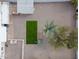 Aerial view of the backyard featuring desert landscaping, turf rectangle, and a playset at 2205 W Cambridge Ave, Phoenix, AZ 85009