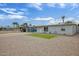 Single-story home showcasing desert landscaping and proximity to neighboring properties at 2205 W Cambridge Ave, Phoenix, AZ 85009