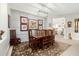 Formal dining room with a large wooden table, upholstered chairs, and decorative wall art at 22222 N 54Th Way, Phoenix, AZ 85054