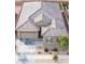 Aerial view of a single Gathering home, with tile roof, manicured landscaping and three car garage at 24478 N 166Th Ave, Surprise, AZ 85387