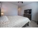 Cozy bedroom features neutral colors, carpeted floors, and a comfortable bed at 24478 N 166Th Ave, Surprise, AZ 85387